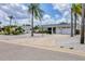 Inviting home boasting lush landscaping, a paved driveway, and a well-kept facade at 325 Fiesole St, Venice, FL 34285