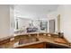 The kitchen features granite countertops, a breakfast bar, and an open layout to the dining and living areas at 3691 Parkridge Cir # 201, Sarasota, FL 34243