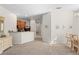 The open-concept living area showcases neutral carpeting, natural light, and seamless flow to the kitchen at 3691 Parkridge Cir # 201, Sarasota, FL 34243