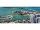 Stunning aerial view showcases a beautiful coastline, bridge, and vibrant cityscape with marina at 4123 Cascade Falls Dr, Sarasota, FL 34243