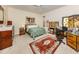 Spacious bedroom featuring a ceiling fan and decorative accents, creating a cozy and inviting atmosphere at 4123 Cascade Falls Dr, Sarasota, FL 34243