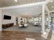 Bright clubhouse featuring elegant chandeliers, large windows, and comfortable seating at 4123 Cascade Falls Dr, Sarasota, FL 34243