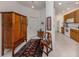 Inviting home entry featuring tile floors, wooden accents, and seamless entry to the kitchen space at 4123 Cascade Falls Dr, Sarasota, FL 34243