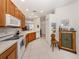 Well-equipped kitchen featuring modern appliances, ample cabinet space, and seamless flow into adjacent rooms at 4123 Cascade Falls Dr, Sarasota, FL 34243