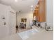 Cozy kitchen nook features a small dining area with white appliances and ample cabinet space at 4123 Cascade Falls Dr, Sarasota, FL 34243