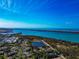 Breathtaking aerial view of coastal neighborhood, showcasing serene waterfront living and beautiful landscape at 4260 Placida Rd # 25D, Englewood, FL 34224