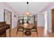 Comfortable dining room featuring a modern light fixture and open layout at 4260 Placida Rd # 25D, Englewood, FL 34224
