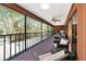 Relax on this screened porch with comfortable seating and lovely views of the surrounding landscaping at 4260 Placida Rd # 25D, Englewood, FL 34224