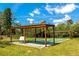 Community shuffleboard courts set in lush green surroundings at 4260 Placida Rd # 25D, Englewood, FL 34224