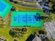 Aerial view of community tennis courts at 4260 Placida Rd # 25D, Englewood, FL 34224