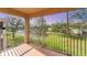 Scenic screened patio view overlooking a lush green space with a serene lake at 4433 Corso Venetia Blvd # C18, Venice, FL 34293