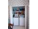Convenient laundry closet featuring a washer and dryer for in-home laundry needs at 457 Longwood Dr, Venice, FL 34285
