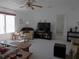 Bright living room with neutral carpet and stylish decor offers a cozy gathering space at 457 Longwood Dr, Venice, FL 34285