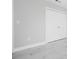 Bedroom featuring modern grey walls and white tile flooring at 4740 Payne St, North Port, FL 34287