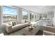 Bright living room with neutral decor, large windows and water view at 4740 Payne St, North Port, FL 34287