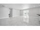 Open and spacious living room with marble floors and water view at 4740 Payne St, North Port, FL 34287