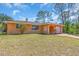 Single story home featuring a cozy design, a well-maintained lawn, and a pleasant, inviting curb appeal at 491 Conrad Rd, Venice, FL 34293