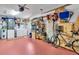 Spacious garage with organized storage, laundry area, and room for parking a vehicle at 491 Conrad Rd, Venice, FL 34293