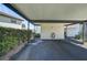 Attached carport for convenient parking at 503 Pine Hollow Cir # 503, Englewood, FL 34223