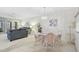 Charming dining room with seating for four, perfect for intimate meals and gatherings at 503 Pine Hollow Cir # 503, Englewood, FL 34223