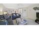 Cozy living room with comfortable seating and ample natural light for relaxation and entertainment at 503 Pine Hollow Cir # 503, Englewood, FL 34223