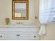 Bathroom featuring a large vanity with a modern sink and plenty of natural light at 521 Circlewood Dr # Q11, Venice, FL 34293