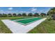 Community bocce ball court with manicured landscaping at 521 Circlewood Dr # Q11, Venice, FL 34293