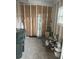 Basement with concrete floor, utilities, and a small window at 524 S Cervina Dr, Venice, FL 34285