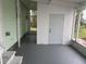 Exterior view of back door leading to enclosed porch at 524 S Cervina Dr, Venice, FL 34285