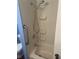 Shower and bath tub featuring a grab bar and shower caddy at 524 S Cervina Dr, Venice, FL 34285