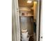 Small storage closet with wood paneling and a single overhead shelf at 532 Via Veneto, Venice, FL 34285