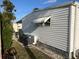 Home with exterior awning, well maintained yard with gravel landscaping at 532 Via Veneto, Venice, FL 34285