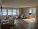 Inviting living room featuring modern floors, neutral walls, and natural light at 532 Via Veneto, Venice, FL 34285