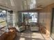 Comfortable sunroom featuring two chairs and a great view at 532 Via Veneto, Venice, FL 34285