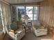 Relaxing sunroom with comfortable seating and a view of the outdoors at 532 Via Veneto, Venice, FL 34285