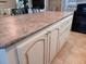Spacious kitchen island with a beautiful countertop and ample storage space at 601 Club House Rd, Venice, FL 34285