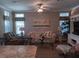 Comfortable living room with cozy seating, ample natural light, and stylish decor at 601 Club House Rd, Venice, FL 34285