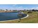 Scenic waterfront with boat docks lining the calm water in a tranquil community at 601 Club House Rd, Venice, FL 34285