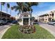 Scenic view of the Venice entrance sign surrounded by lush landscaping and vibrant flowers on a sunny day at 616 Circlewood Dr # S2-14, Venice, FL 34293