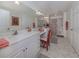 Spacious bathroom with double vanity, plenty of counter space, and a large mirror at 632 Golf Dr # 632, Venice, FL 34285