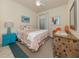 Cozy bedroom with beach-themed decor, natural light, and a serene ambiance at 632 Golf Dr # 632, Venice, FL 34285