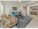 Cozy living room with a comfortable sofa, patterned chairs, and stylish rug at 632 Golf Dr # 632, Venice, FL 34285