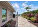 An outdoor patio with waterfront views for relaxing and entertaining at 704 Laguna Dr, Venice, FL 34285