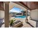 View of the refreshing private pool and patio, an outdoor oasis for relaxation and entertainment at 715 Golden Beach Blvd, Venice, FL 34285