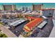 Aerial view of the complex near the ocean, showcasing the buildings and carport area at 720 Apalachicola Rd # 104, Venice, FL 34285