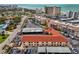 Aerial view of a beachfront condo community featuring covered parking and close beach access at 720 Apalachicola Rd # 104, Venice, FL 34285