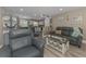 Open living room that flows into the kitchen with stylish furnishings and decor at 720 Apalachicola Rd # 104, Venice, FL 34285