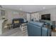 Cozy living room with stylish decor, comfortable seating, and entertainment center at 720 Apalachicola Rd # 104, Venice, FL 34285