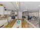 Open living space with kitchen, living room, and dining area with coastal accents at 720 Apalachicola Rd # 104, Venice, FL 34285