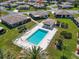Aerial view of community pool and surrounding homes at 761 Vivienda South Ct # 14, Venice, FL 34293